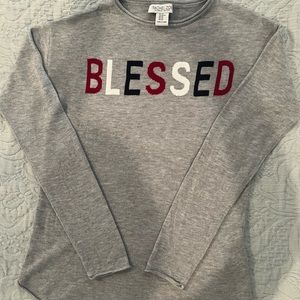 Rachel Zoe…Light grey sweater. Not heavy, wearable nearly all year.